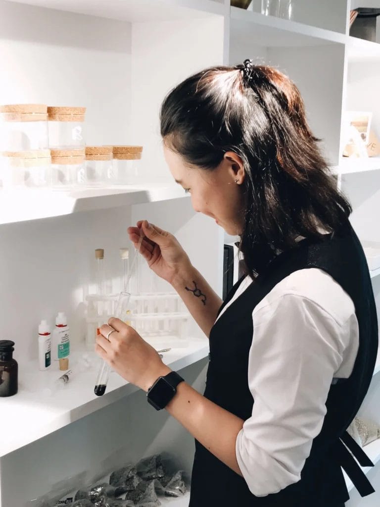 Vanessa working with coffee science